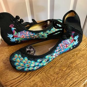 Peacock embroidered black flats